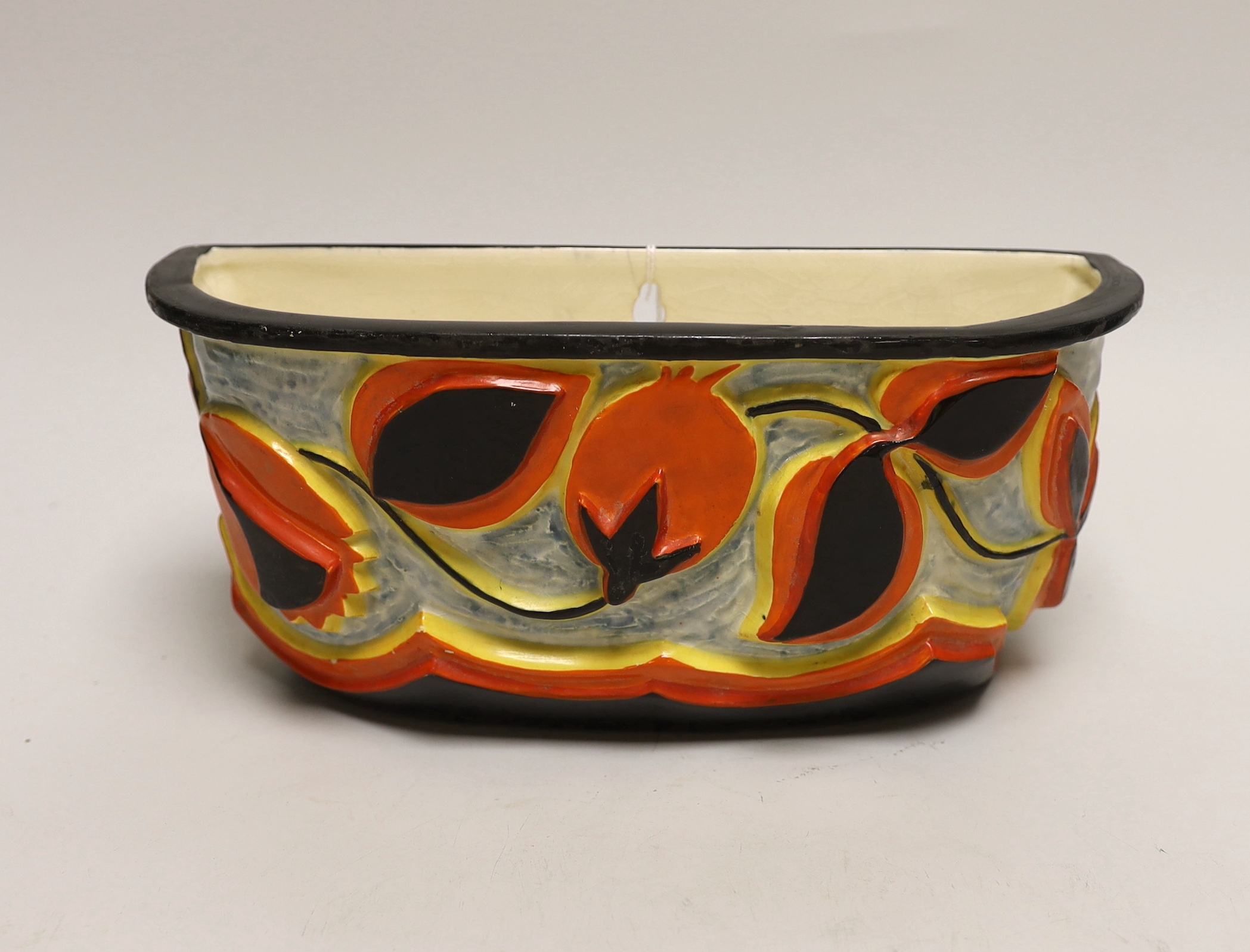 A Clarice Cliff wall vase 26cm wide
